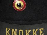 an image of a black hat with a red eye on it