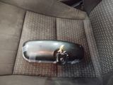 an image of a car seat with a broken mirror on it