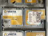 many different batteries in the back of a truck
