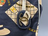 a bag with two rings on it and a ring in it
