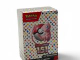 a close up of a box of pokemon trading cards on a white background