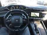the interior of a car with a steering wheel and a dash board