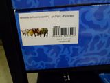 une boîte bleue sur laquelle figure l'image d'un troupeau de vaches