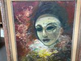 an oil painting of a woman ' s face is shown in a frame