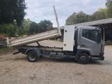 a truck that is parked on the side of the road