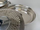 a silver plate with a picture of a man on it