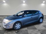 a picture of a silver car parked in a garage