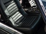 a black leather seat in the back of a car
