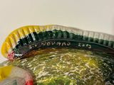 a close up of a plastic container with food inside of it