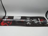 a close up of a skateboard sitting on top of a bag