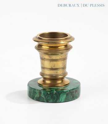 an image of a green and gold candle holder on a white background