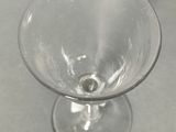 a glass that is sitting on top of a table