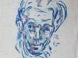 dessin représentant le visage d'un homme sur une feuille de papier