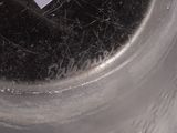 a close up of a piece of paper in a metal container