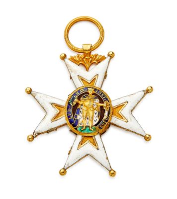 l'image d'une médaille d'or et de blanc ornée d'une croix