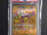 a close up of a pokemon card in a plastic case