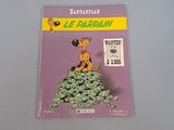 a book with a cartoon dog on top of a pile of money