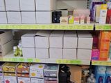 many boxes and boxes on the shelves in the store