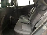 the back seats of a car with a seat belt in the back of it