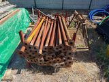 a lot of pipes that are sitting on the ground