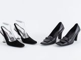 une paire de chaussures noires à talons hauts ornées d'un nœud sur le talon