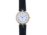 a close up of a wrist watch with roman numerals on it