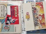 a lot of comic books on the table together