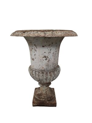 un vase blanc posé sur une table