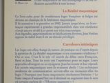 the back cover of a book with a picture of a man in a suit