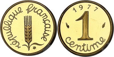 a close up of a coin with the number one on it