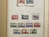 an open book with a bunch of stamps on it