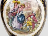 a vase with a picture of a woman and a man on it