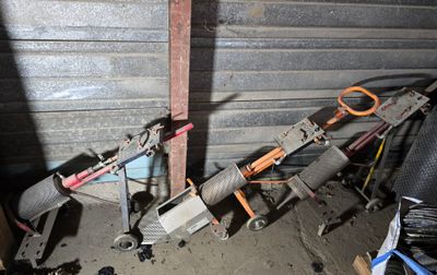a pile of assorted items in a garage
