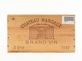 a wooden box with a wine label on it