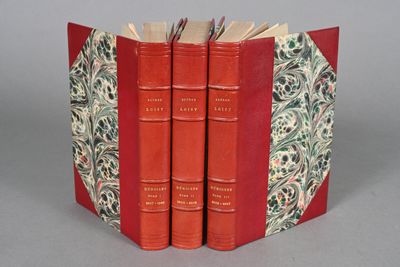 three books that are sitting on top of each other
