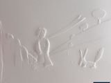a drawing of a man and a woman on a wall
