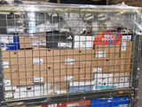 a metal cage with boxes on top of it