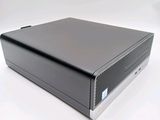 an image of a black computer sitting on top of a white table