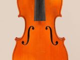 an old violin with a bow on a white background