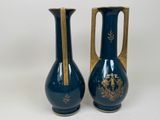 pair of blue vases with gold accents on a white background