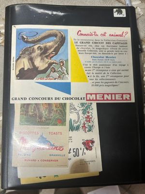 a black folder with a picture of an elephant on it