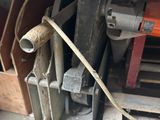 a machine that is sitting on a pallet in a garage