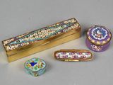 several different types of jewelry are displayed on a white surface