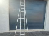 an image of a ladder leaning up against a garage door