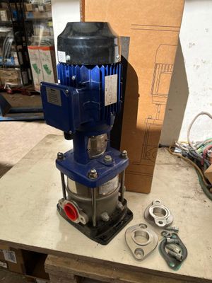 a blue machine that is sitting on top of a table