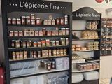 a large display of food in a store that is empty