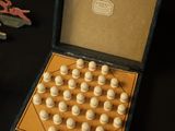 a box with a bunch of buttons inside of it