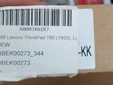 someone is holding a box with a barcode on it
