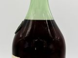 a bottle of alcohol that is sitting on a table