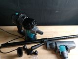 an image of a blow dryer and other tools on a table